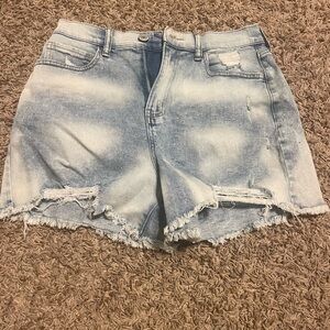High rise denim shorts with frayed hem